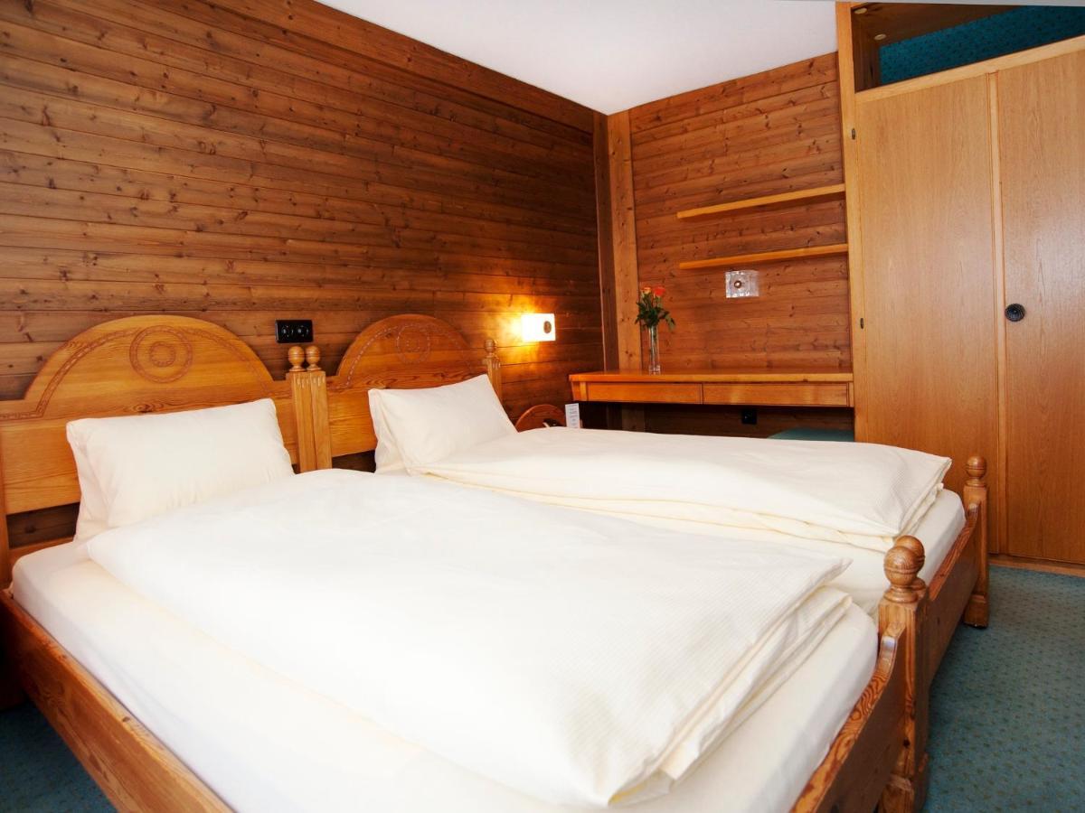 Ambiente Guesthouse Saas Fee Pokoj fotografie